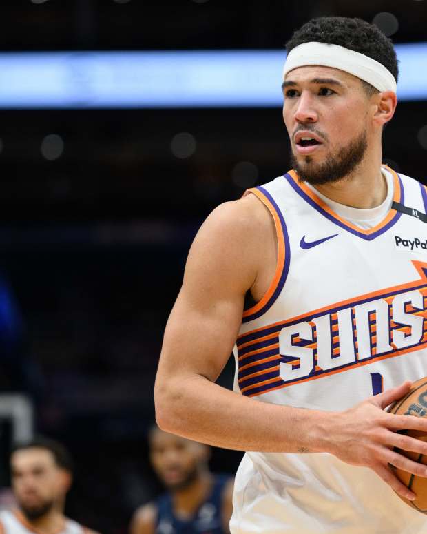 Jan 16, 2025; Washington, District of Columbia, USA; Phoenix Suns guard Devin Booker (1) looks on during the third quarter against the Washington Wizards at Capital One Arena. Mandatory Credit: Reggie Hildred-Imagn Images