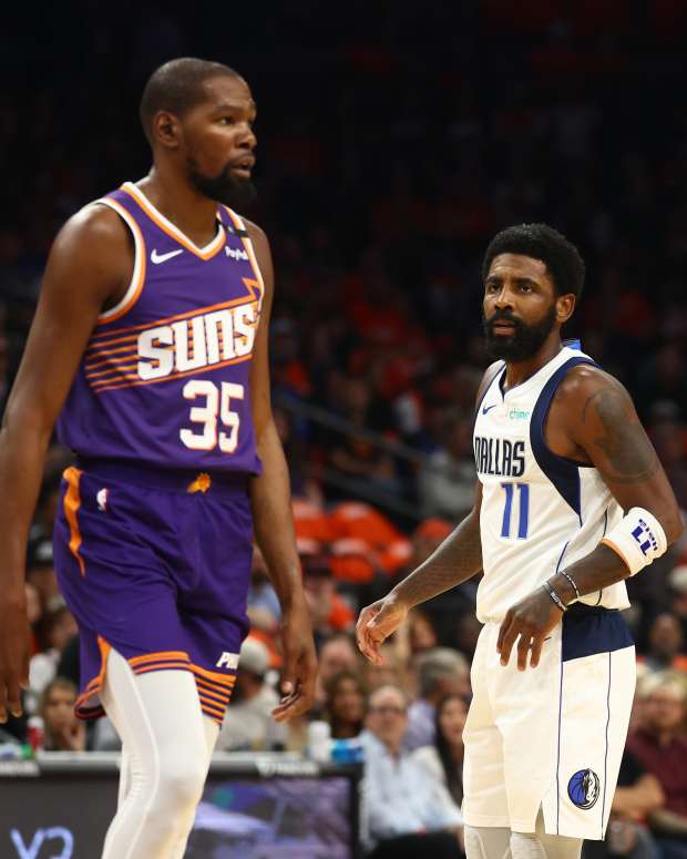 Dallas Mavericks guard Kyrie Irving (11) and Phoenix Suns forward Kevin Durant (35)