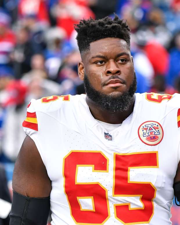 Kansas City Chiefs guard Trey Smith (65) leaves the field after warm ups before a game against the Buffalo Bills at Highmark Stadium.