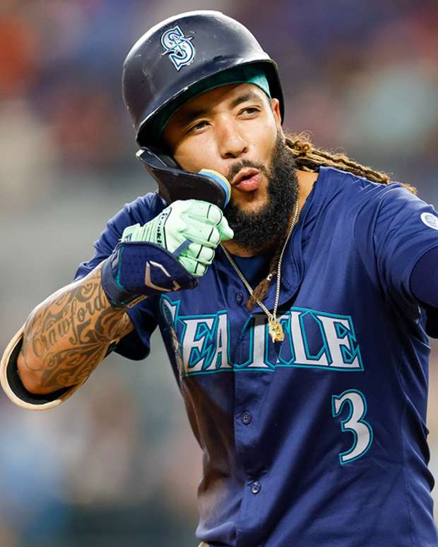 Seattle Mariners shortstop J.P. Crawford celebrates his triple against the Texas Rangers at Globe Life Field on Sept. 21, 2024.