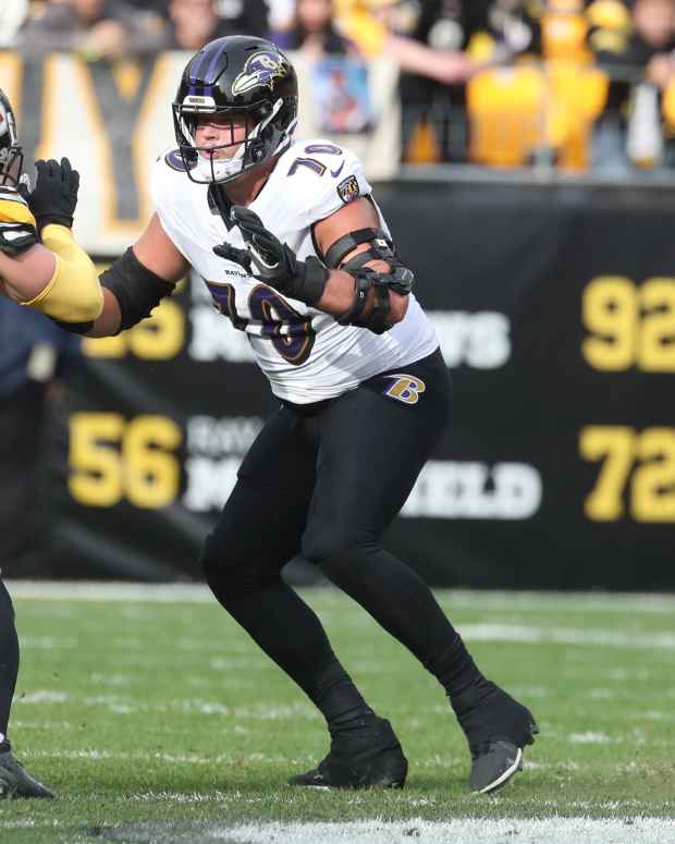 Nov 17, 2024; Pittsburgh, Pennsylvania, USA; Baltimore Ravens offensive tackle Roger Rosengarten (70) blocks at the line of scrimmage against Pittsburgh Steelers linebacker T.J. Watt (90) during the second quarter at Acrisure Stadium.