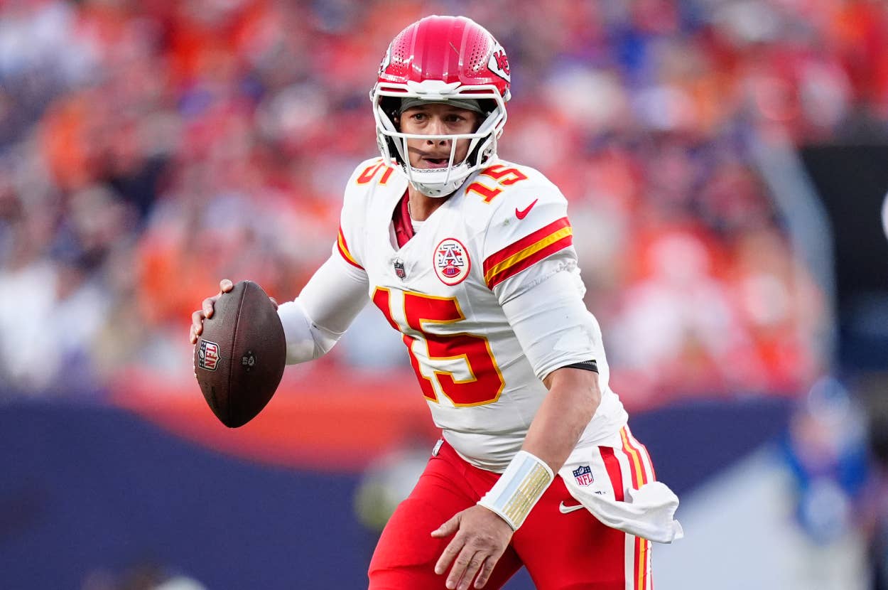 Patrick Mahomes in the Kansas City Chiefs number 15 uniform, holding the football during an NFL game