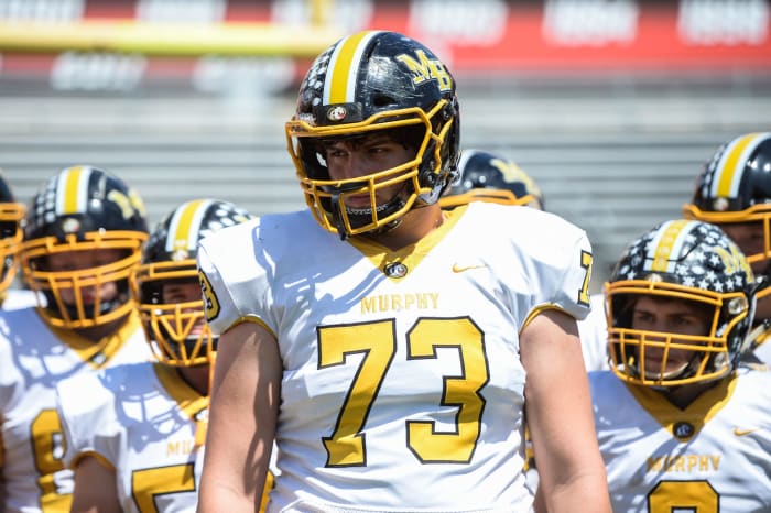 Murphy's senior offensive lineman Yousef Mugharbil, 73, won a second state championship on Saturday as the Bulldogs defeated Northside-Pinetown. A three-star recruit, he will play college football in Florida. Yousef Mugharbil 1