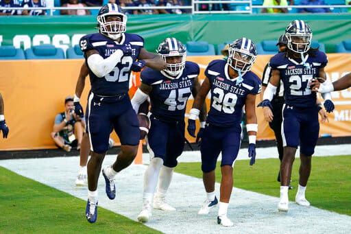 Jackson State linebacker Aubrey Miller Jr. (45) celebrates with Khalil Arrington (52), Tayvion Beasley (28) and Kevin May (27) after recovering for a touchdown in the second half of the Orange Blossom Classic NCAA college football game .  Sunday, September 4, 2022, in Miami Gardens, Florida, Jackson State won 59-3.