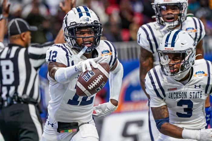 Atlanta, GA, USA;  Jackson State Tigers wide receiver Travis Hunter (12) reacts after catching a touchdown against the North Carolina Central Eagles in the second half during the Celebration Bowl at Mercedes-Benz Stadium.