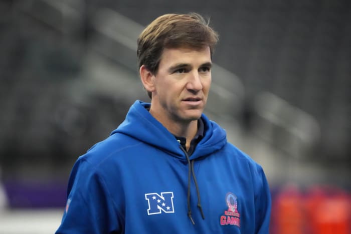 Eli Manning Hilariously Reacts To Viral Arch Manning Shirtless Meme