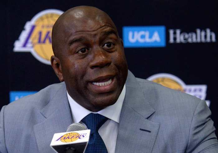 Los Angeles Lakers president of basketball operations Magic Johnson speaks to media before introducing newly drafted player Lonzo Ball at Toyota Sports Center. 