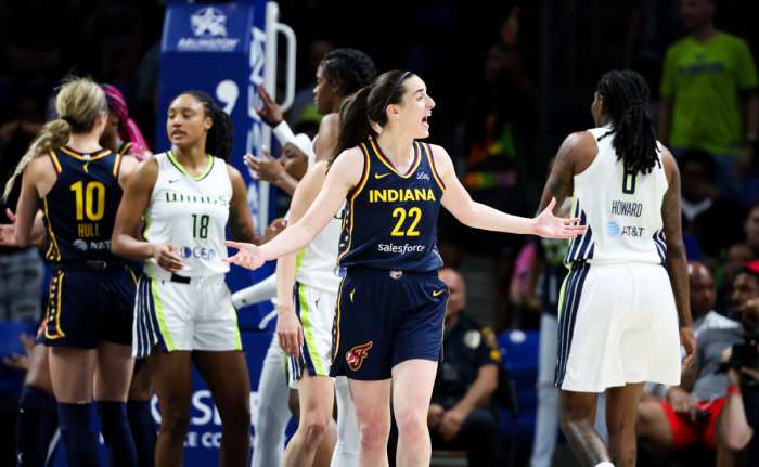 Indiana Fever guard Caitlin Clark (22) reacts during the second half against the Dallas Wings at College Park Center.