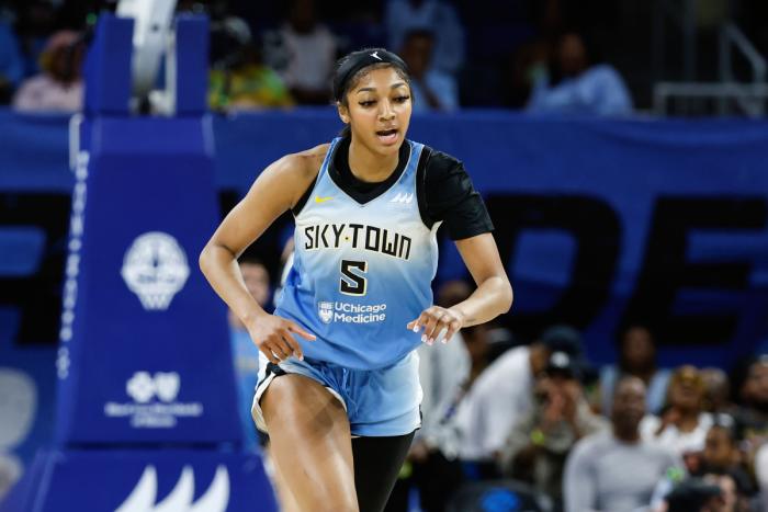 Chicago Sky forward Angel Reese (5) reacts during the first half of a WNBA game against the Connecticut Sun at Wintrust Arena.