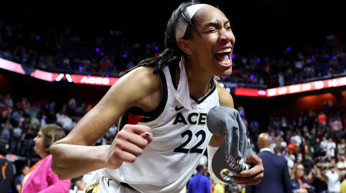Las Vegas Aces center A’ja Wilson celebrates after her team defeated the Connecticut Sun in Game 4 of the WNBA Finals to win the league championship on Sept. 18, 2022 in Uncasville, Connecticut.