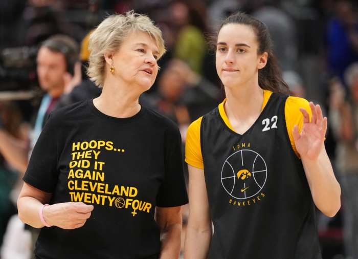 Iowa Hawkeyes head coach Lisa Bluder and Iowa Hawkeyes guard Caitlin Clark (22) talk during practice for the NCAA Women's Final Four championship basketball game between Iowa and South Carolina at Rocket Mortgage Fieldhouse, Saturday, April 6, 2024 in Cleveland.