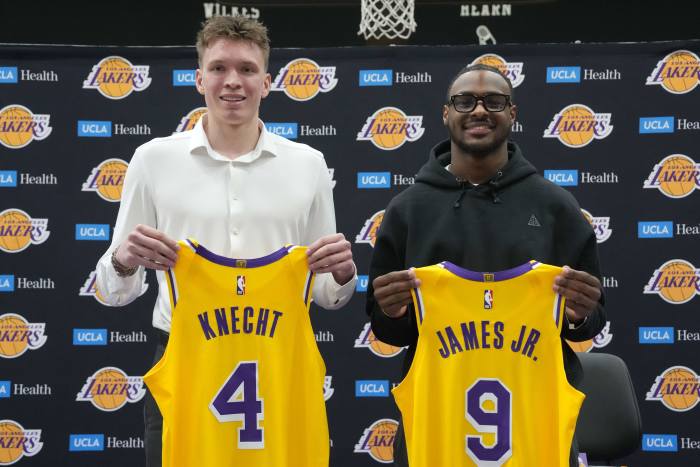 Los Angeles Lakers first round draft pick Dalton Knecht (4) and second round draft pick Bronny James (9)