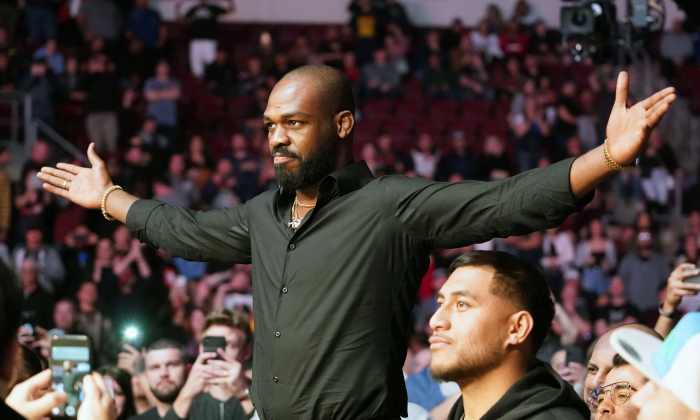 Feb 15, 2020; Rio Rancho, New Mexico, USA; UFC fighter Jon Jones attends the light heavyweight bout between Jan Blachowicz (blue) and Corey Anderson (red) during UFC Fight Night at Santa Ana Star Arena.