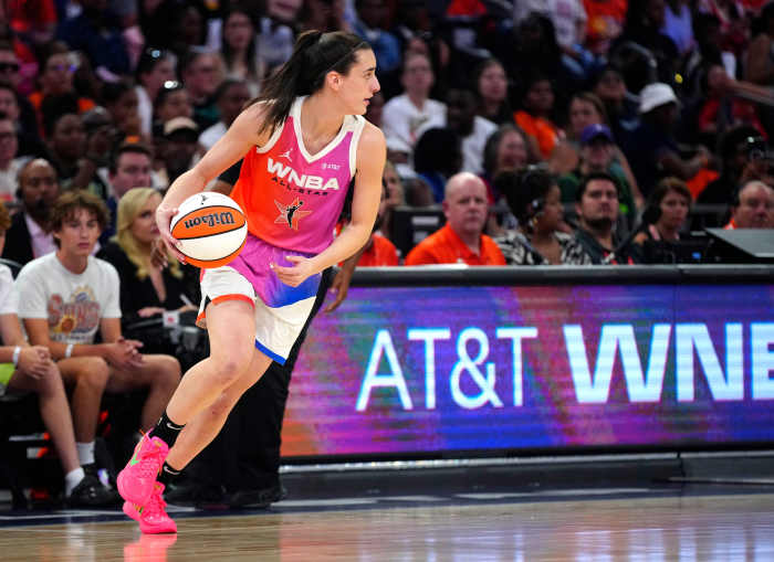 Team WNBA guard Caitlin Clark dribbles up the court during the WNBA All-Star Game in Phoenix on July 20, 2024.