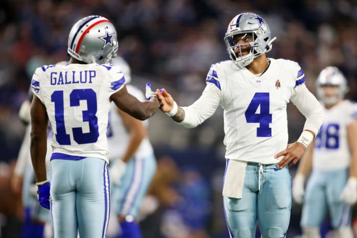 Nov 12, 2023; Arlington, Texas, USA; Dallas Cowboys wide receiver Michael Gallup (13) and quarterback Dak Prescott (4) celebrate a touchdown in the third quarter against the New York Giants at AT&T Stadium. Mandatory Credit: Tim Heitman-USA TODAY Sports  