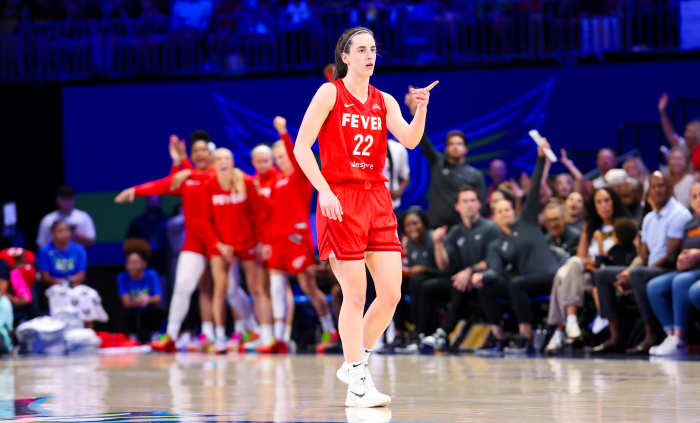 Indiana Fever guard Caitlin Clark reacts during the second half against the Dallas Wings.