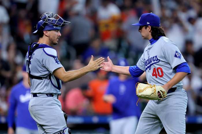 Houston, Texas, USA; Los Angeles Dodgers relief pitcher Brent Honeywell (40) is congratulated by catcher Austin Barnes (15) after the final out against the Houston Astros during the ninth inning at Minute Maid Park - Erik Williams-USA TODAY Sports