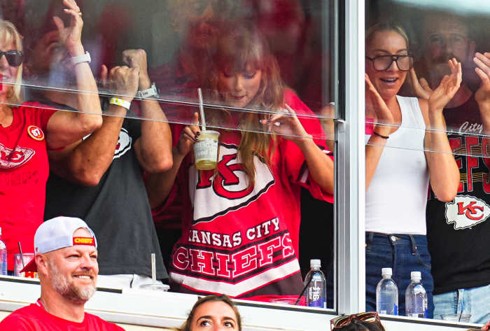 Recording artist Taylor Swift celebrates after a Kansas City Chiefs touchdown.