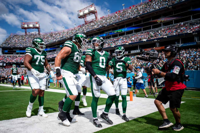 New York Jets running back Braelon Allen (0) celebrates his touchdown against the Tennessee Titans during the second quarter at Nissan Stadium in Nashville, Tenn., Sunday, Sept. 15, 2024.