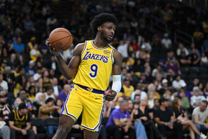 Oct 4, 2024; Palm Desert, California, USA; Los Angeles Lakers guard Bronny James (9) looks to pass against the Minnesota Timberwolves during the second half at Acrisure Arena.