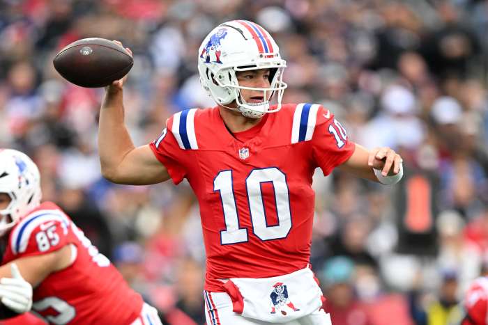 New England Patriots quarterback Drake Maye (10) looks to throw the ball against the Houston Texans during the first half at Gillette Stadium.
