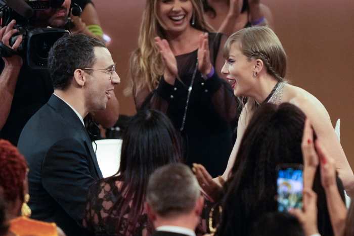 Taylor Swift celebrates with Jack Antonoff at the 2024 Grammy Awards.