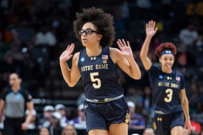 Notre Dame Fighting Irish guard Olivia Miles (5) celebrates a three-pointer during Notre Dame's Sweet 16 loss to the TCU Horned Frogs.