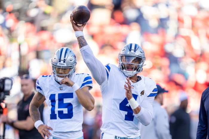 Dallas Cowboys quarterback Dak Prescott (4) passes the football in front of quarterback Trey Lance (15) before the game against the San Francisco 49ers at Levi's Stadium.