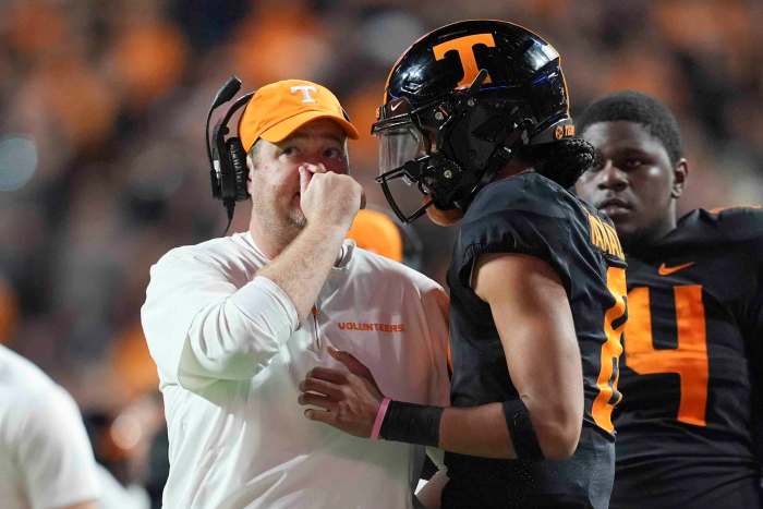 Tennessee head coach Josh Heupel talks to Tennessee quarterback Nico Iamaleava.