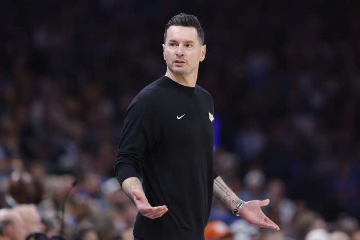 Los Angeles Lakers head coach JJ Redick gestures to his team during a play against the Oklahoma City Thunder during the second quarter at Paycom Center. Mandatory Credit: Alonzo Adams-Imagn Images