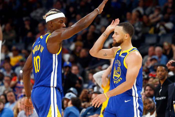 Golden State Warriors forward Jimmy Butler III (10) and guard Steph Curry (30).