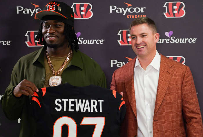 Cincinnati Bengals first-round draft pick Shemar Stewart, left, and head coach Zac Taylor, right, pose together ahead of a press conference, Friday, April 25, 2025, at Paycor Stadium in Downtown Cincinnati.