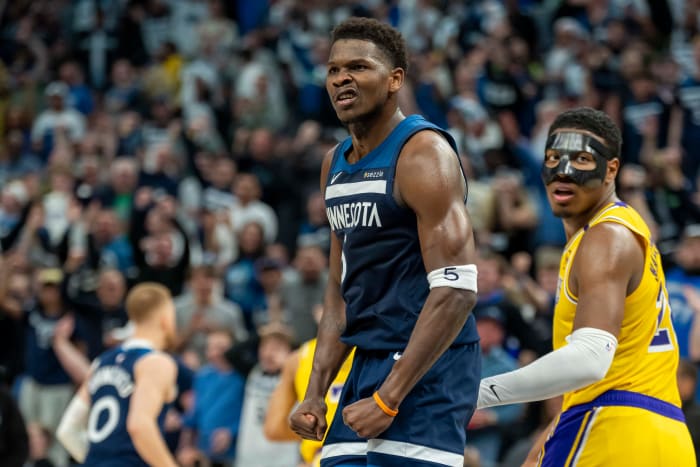 Minneapolis, Minnesota, USA; Minnesota Timberwolves guard Anthony Edwards (5) reacts after making a shoot against the Los Angeles Lakers in the second half during game three of first round for the 2024 NBA Playoffs at Target Center.