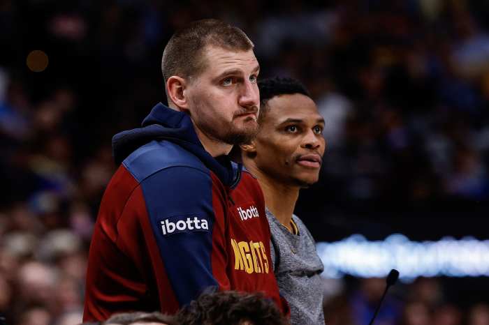 Denver Nuggets center Nikola Jokic (15) and guard Russell Westbrook (4) look on in the second quarter against the Cleveland Cavaliers
