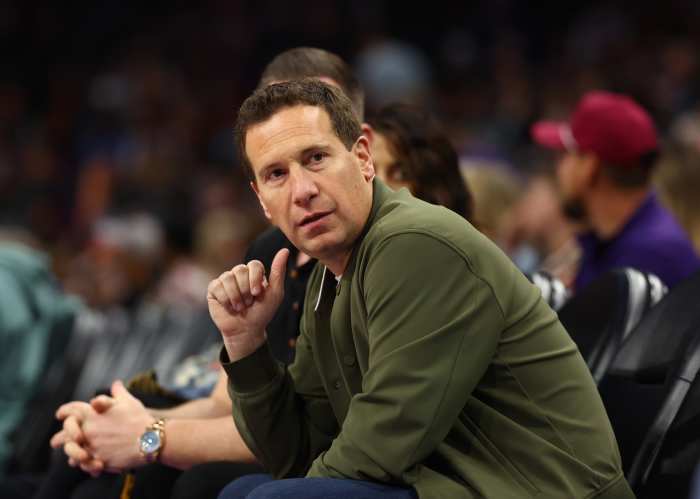 Phoenix Suns owner Mat Ishbia sits courtside against the Indiana Pacers at Footprint Center.