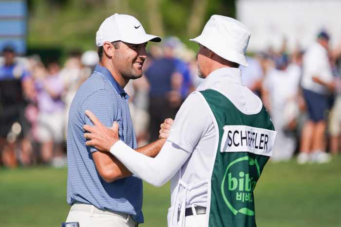 Scottie Scheffler and his caddy at the Byron Nelson Classic.