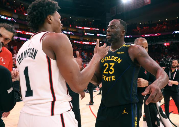 May 4, 2025; Houston, Texas, USA; Golden State Warriors forward Draymond Green (23) greets Houston Rockets forward Amen Thompson (1) after game seven of the first round for the 2025 NBA Playoffs at Toyota Center. Mandatory Credit: Troy Taormina-Imagn Images