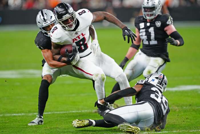 Atlanta Falcons TE Kyle Pitts is tackled in a game against the Las Vegas Raiders. Stephen R. Sylvanie-Imagn Images