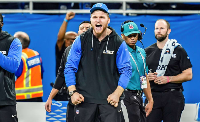 Detroit Lions defensive end Aidan Hutchinson watches a play from the sidelines at Ford Field in Detroit.