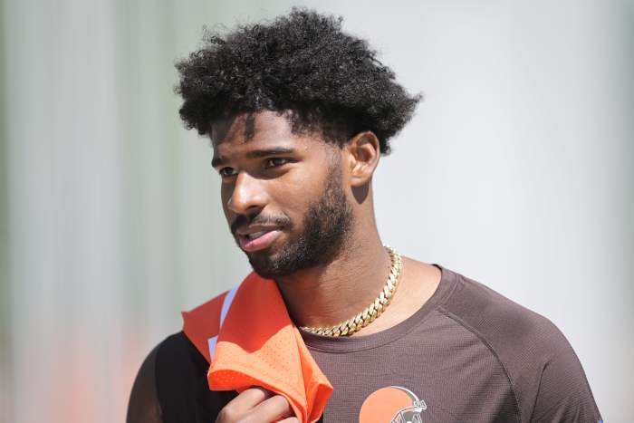 Cleveland Browns quarterback Shedeur Sanders (12) walks off the field after rookie minicamp at CrossCountry Mortgage Campus.