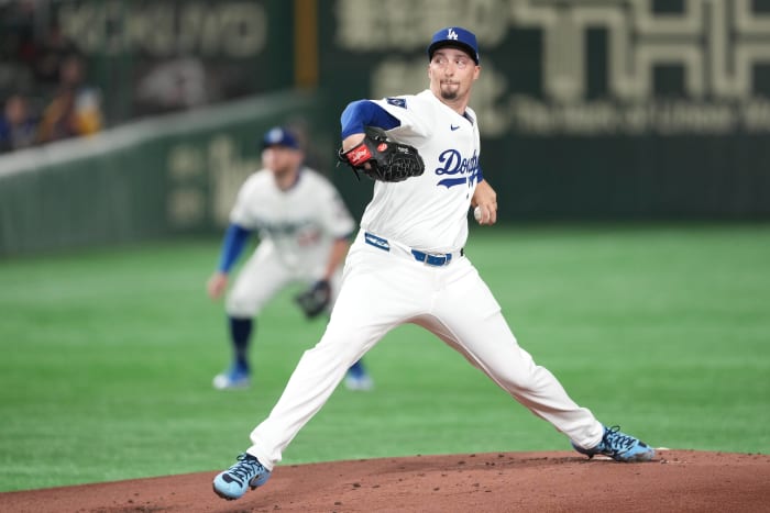 Los Angeles Dodgers starting pitcher Blake Snell (7) throws a pitch against the Hanshin Tigers during the first inning at Tokyo Dome.
