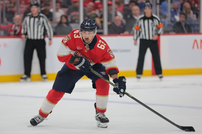Florida Panthers center Brad Marchand (63) moves the puck against the Toronto Maple Leafs at Amerant Bank Arena.
