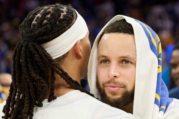 Golden State Warriors guard Stephen Curry (30) hugs guard Damion Lee (obscured) after the game between the Phoenix Suns and the Golden State Warriors at Chase Center.