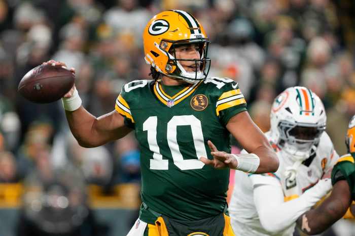 Green Bay Packers quarterback Jordan Love (10) throws a pass during the first quarter against the Miami Dolphins at Lambeau Field.