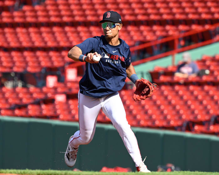 Boston Red Sox second baseman Kristian Campbell (28) warms up before a game against the Atlanta Braves at Fenway Park.