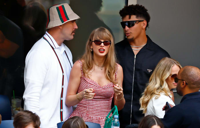 Recording artist Taylor Swift, Kansas City Chiefs tight end Travis Kelce, and quarterback Patrick Mahomes look on in the men’s singles final of the 2024 U.S. Open tennis tournament.