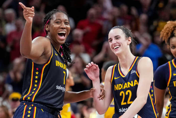 Indiana Fever's Aliyah Boston (7) and Caitlin Clark (22).