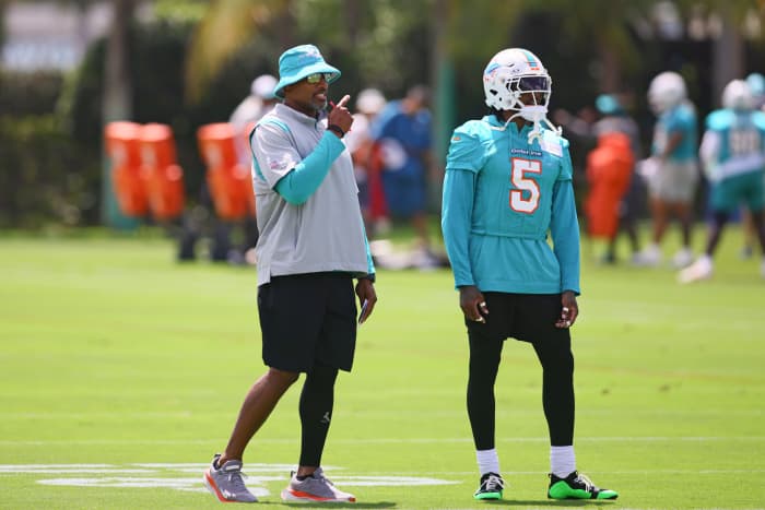 Miami Dolphins defensive coordinator Anthony Weaver talks to cornerback Jalen Ramsey (5) during mandatory minicamp at Baptist Health Training Complex.
