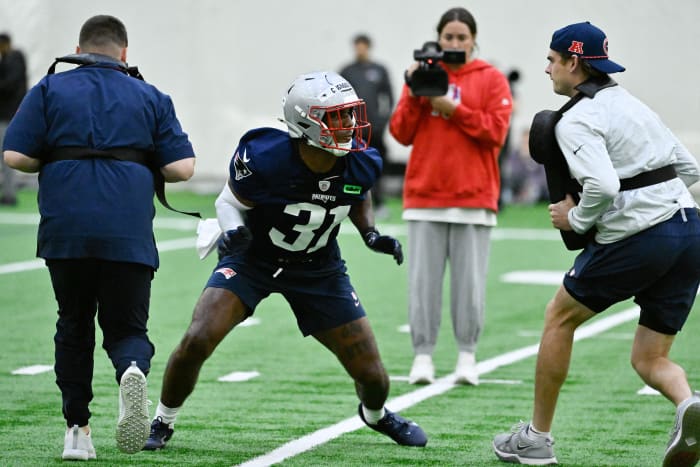 New England Patriots safety Craig Woodson (31) works with coaching staff at practice during rookie camp at Gillette Stadium.