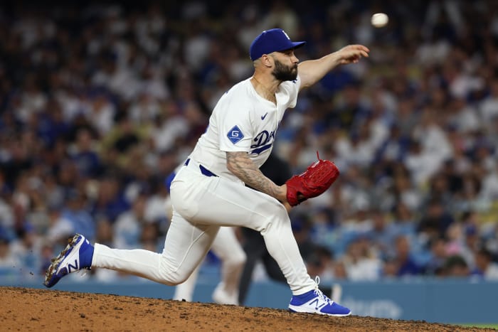 Los Angeles Dodgers pitcher Tanner Scott (66) throws during the eighth inning against the New York Yankees at Dodger Stadium.